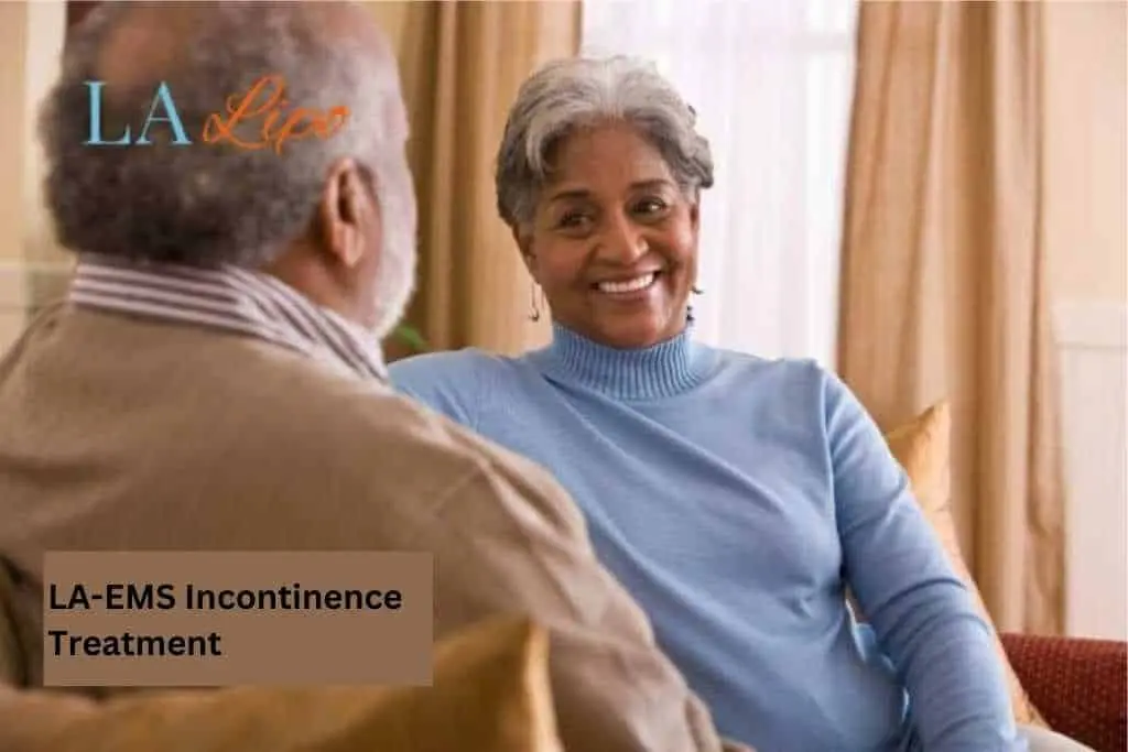 Couple sat smiling at each other - LA-EMS treatment West Dulwich