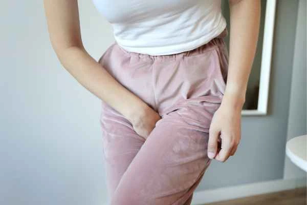 woman running for the toilet because of urinary incontinence West Dulwich